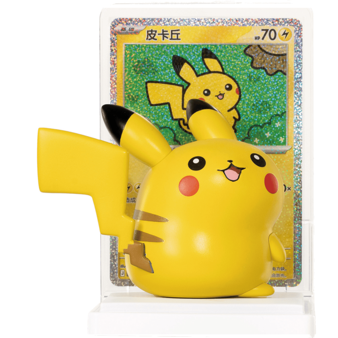 Smiling Pikachu figure on a display stand beside its matching foil card
